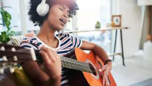 Read more about the article Can You Plug Headphones into A Guitar?