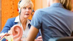 Read more about the article Can You Wear Headphones With Hearing Aids?